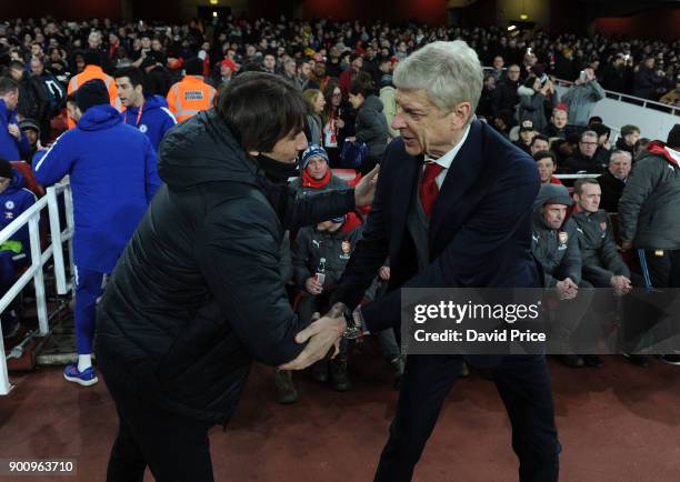 Arsene Wenger the Arsenal Manager shakes hands with Antonio Conte the Chelsea Manager before the Premier League match between Arsenal and Chelsea at...