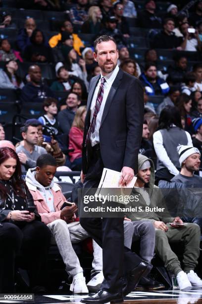 Assistant Coach Chris Fleming of the Brooklyn Nets reacts to a play during the game against the Orlando Magic on January 1, 2018 at Barclays Center...