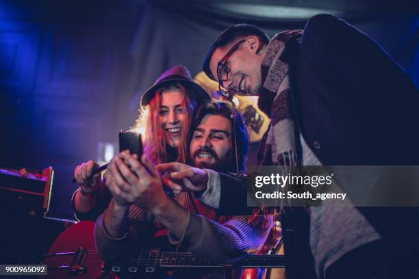 band taking selfie - rock group stock pictures, royalty-free photos & images