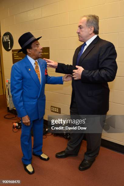 Ernie Grunfeld and Sonny Hill talk before the game between the Washington Wizards and the Philadelphia 76ers on November 29, 2017 at the Wells Fargo...