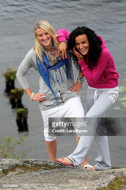 Anja Mittag and Fatmire Bajramaj pose during a German National Team photocall on August 26, 2009 in Tampere, Finland.