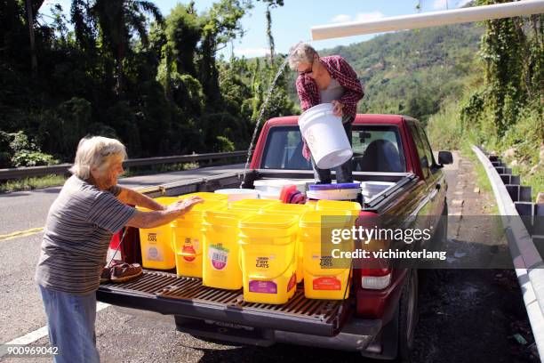 puerto rico recovery, dec., 2017 - 2017 hurricane maria stock pictures, royalty-free photos & images