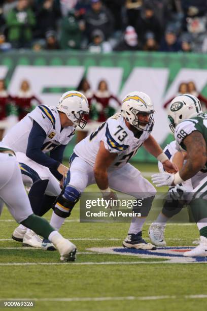 Center Spencer Pulley of the Los Angeles Chargers in action against the New York Jets in an NFL game at MetLife Stadium on December 24, 2017 in East...