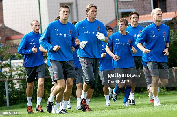 Players of Club Brugge Jeroen Simaeys, Geert De Vlieger, Roy Meeus and Karel Geraerts participate in a training session on August 26, 2009 in Brugge,...