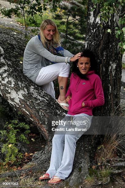 Anja Mittag and Fatmire Bajramaj pose during a German National Team photocall on August 26, 2009 in Tampere, Finland.