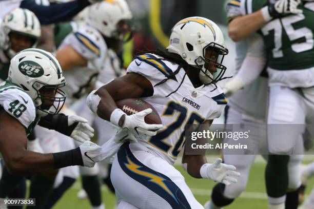 Running Back Melvin Gordon of the Los Angeles Chargers in action against the New York Jets in an NFL game at MetLife Stadium on December 24, 2017 in...