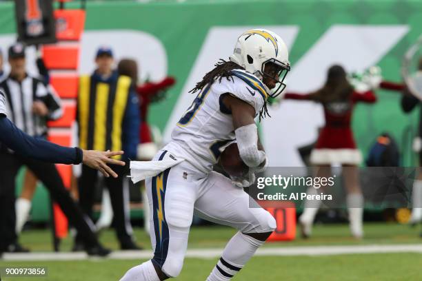 Running Back Melvin Gordon of the Los Angeles Chargers in action against the New York Jets in an NFL game at MetLife Stadium on December 24, 2017 in...