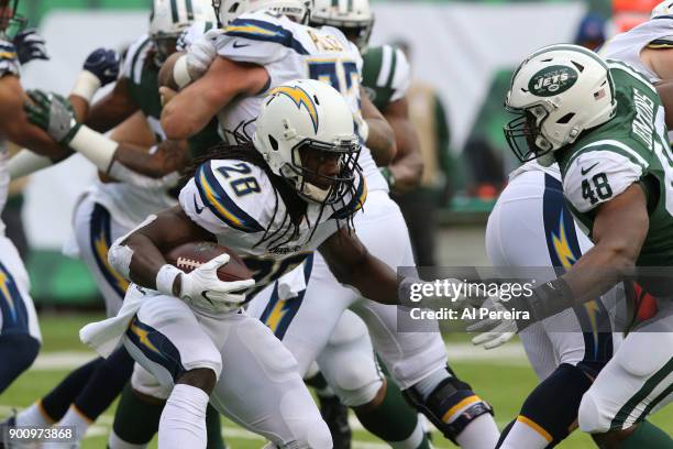 Running Back Melvin Gordon of the Los Angeles Chargers in action against the New York Jets in an NFL game at MetLife Stadium on December 24, 2017 in...