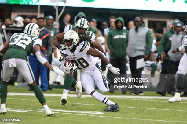 Running Back Melvin Gordon of the Los Angeles Chargers in action against the New York Jets in an NFL game at MetLife Stadium on December 24, 2017 in...