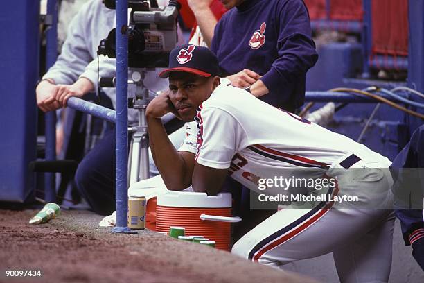 Albert Belle of the Cleveland Indians looks on during a baseball game against the Boston Red Sox on April 2, 1992 at Cleveland Municipal Stadium in...