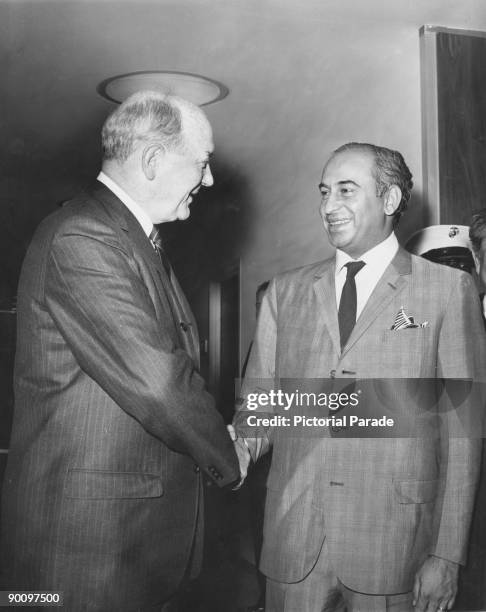 American Secretary of State Dean Rusk with Foreign Minister of Pakistan Zulfikar Ali Bhutto at the US Mission to the United Nations, New York, circa...