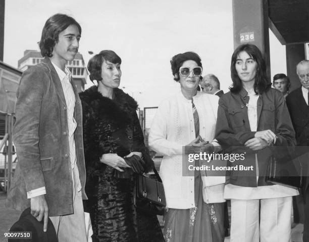 Begum Almas Daulatana , wife of the Pakistani Ambassador greets the wife and children of Pakistani President Zulfikar Ali Bhutto, at London Airport ,...