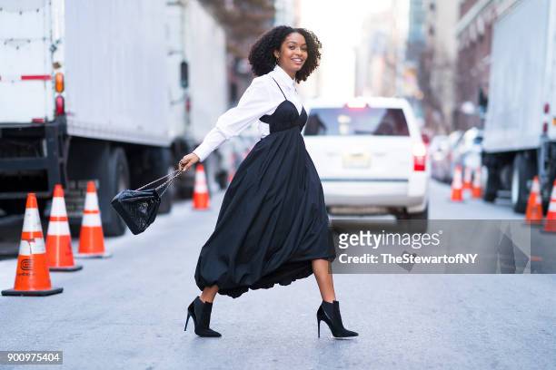 Yara Shahidi is seen wearing 3.1 Phillip Lim with a Chanel handbag, Loriblu boots and Paige Novick earrings in Chelsea on January 3, 2018 in New York...