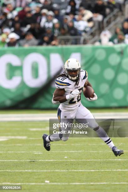 Running Back Melvin Gordon of the Los Angeles Chargers in action against the New York Jets in an NFL game at MetLife Stadium on December 24, 2017 in...