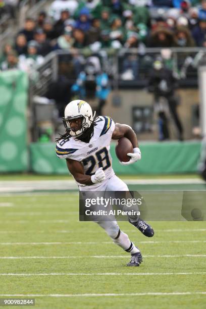 Running Back Melvin Gordon of the Los Angeles Chargers in action against the New York Jets in an NFL game at MetLife Stadium on December 24, 2017 in...