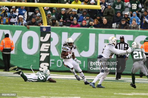 Running Back Melvin Gordon of the Los Angeles Chargers in action against the New York Jets in an NFL game at MetLife Stadium on December 24, 2017 in...