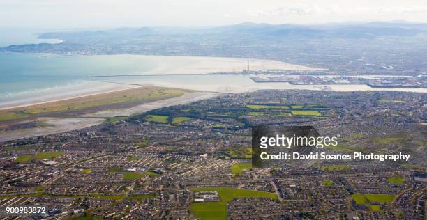 an aerial view over dublin bay, ireland - dublin aerial stock pictures, royalty-free photos & images
