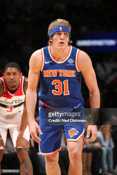 Ron Baker of the New York Knicks looks on during the game against the Washington Wizards on January 3, 2018 at Capital One Arena in Washington, DC....