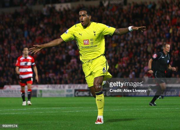 Tom Huddlestone of Tottenham Hotspur celebrates after scoring the opening goal during the Carling Cup second round match between Doncaster Rovers and...