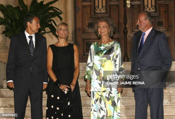 Spain's King Juan Carlos and Queen Sofia pose with Spanish Prime Minister Jose Luis Zapatero and his wife Sonsoles Espinosa at the Marivent Palace in...