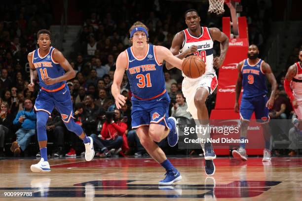 Ron Baker of the New York Knicks handles the ball against the Washington Wizards on January 3, 2018 at Capital One Arena in Washington, DC. NOTE TO...