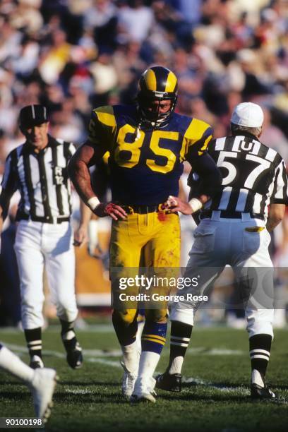 Defensive end Jack Youngblood of the Los Angeles Rams walk on the field during the 1984 NFC Wild Card playoff game against the New York Giants at...
