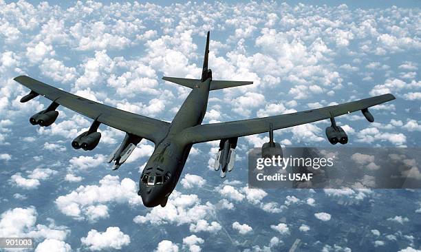 An air-to-air front view of a B-52G Stratofortress aircraft from the 416th Bombardment Wing armed with AGM-86B Air-Launched Cruise Missiles .