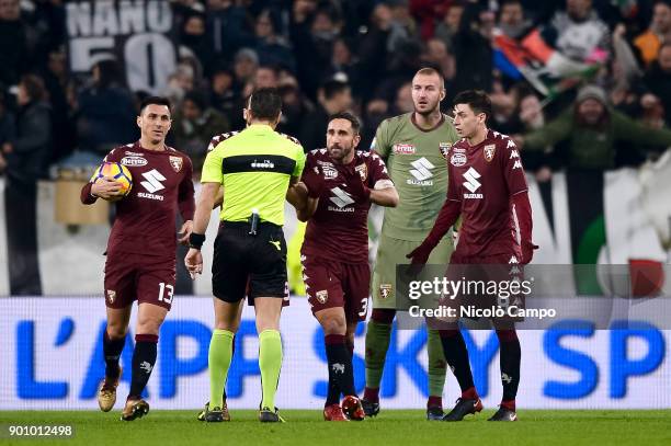 Torino FC players protest with the referee Daniele Doveri during the TIM Cup football match between Juventus FC and Torino FC. Juventus FC won 2-0...