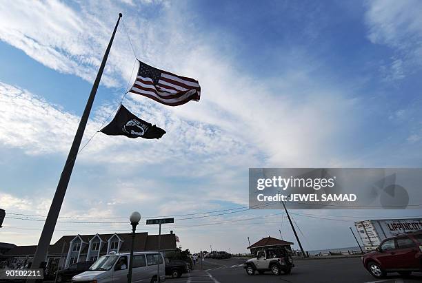 The US flag flies at half mast in honor of late Senator Ted Kennedy in Oak Bluffs on Martha's Vineyard, Massachusetts, on August 26 where US...