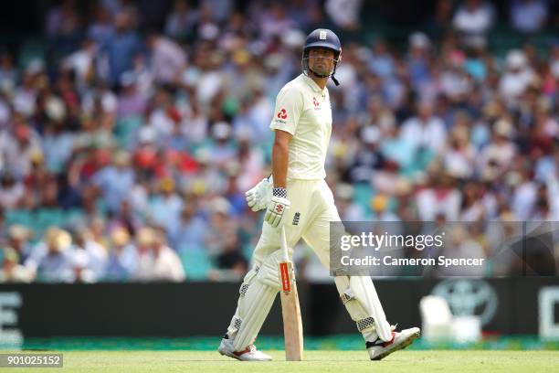 Alastair Cook of England leaves the field after being dismissed by Josh Hazlewood of Australia for lbw during day one of the Fifth Test match in the...