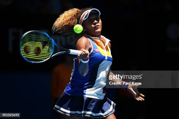 Naomi Osaka of Japan plays a forehand in her singles match against Anastasia Pavlyuchenkova of Russia on day six of the 2018 Hopman Cup at Perth...