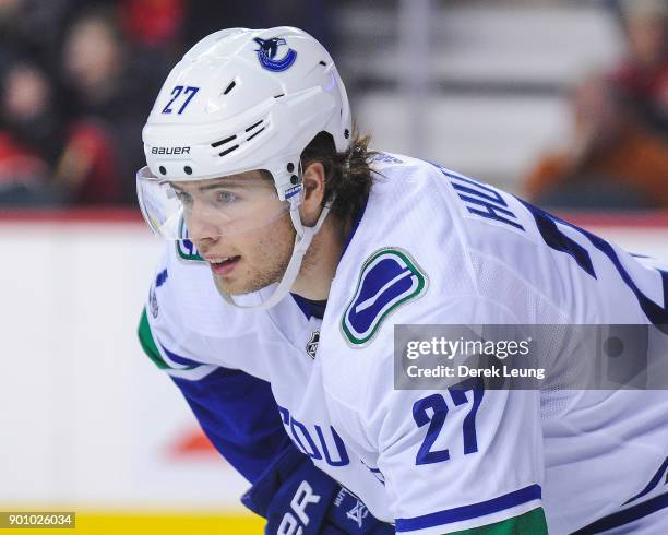 Ben Hutton of the Vancouver Canucks in action against the Calgary Flames during an NHL game at Scotiabank Saddledome on December 9, 2017 in Calgary,...