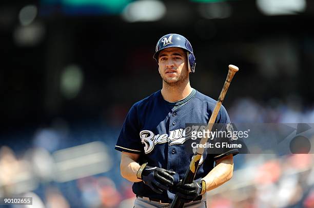 Ryan Braun of the Milwaukee Brewers walks towards the dugout after breaking his bat during the game against the Washington Nationals at Nationals...