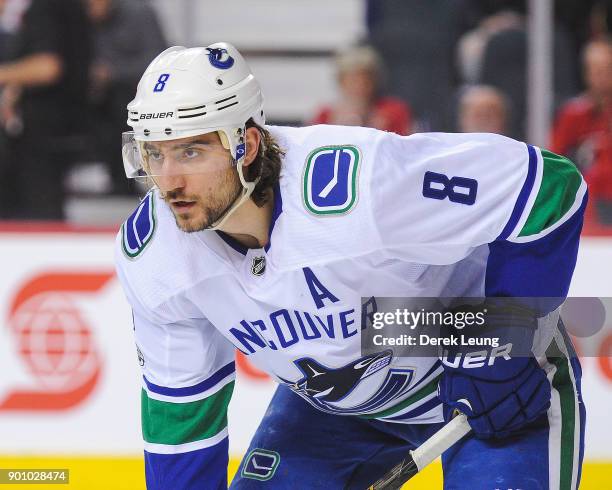 Chris Tanev of the Vancouver Canucks in action against the Calgary Flames during an NHL game at Scotiabank Saddledome on December 9, 2017 in Calgary,...