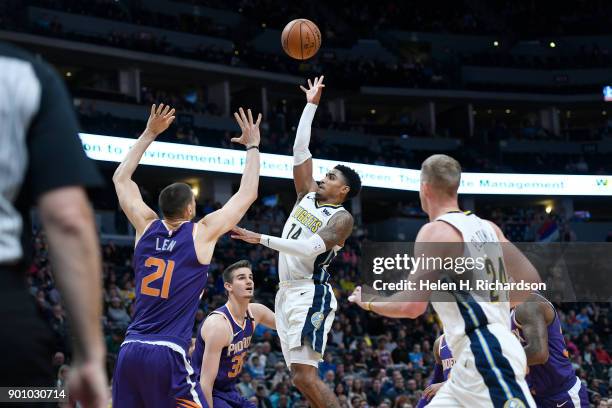 Denver Nuggets guard Gary Harris, #14, takes a shot at the basket during the first half of NBA game at Pepsi Center on January 3, 2018 in Denver,...