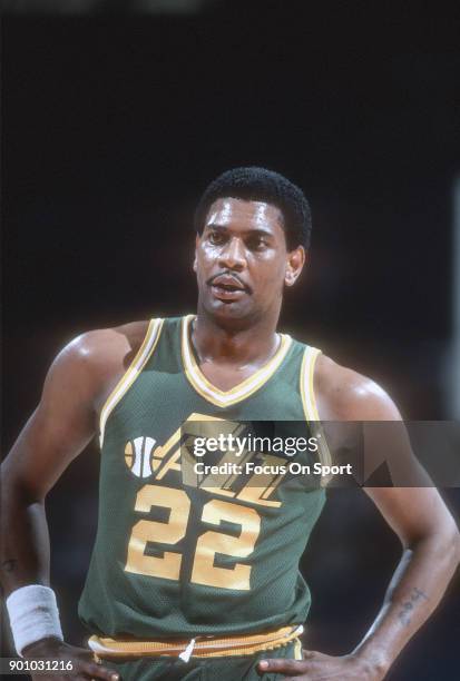 John Drew of the Utah Jazz looks on against the Washington Bullets during an NBA basketball game circa 1983 at The Capital Centre in Landover,...