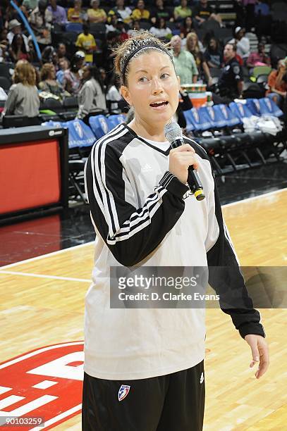 Shanna Crossley of the San Antonio Silver Stars talks to the crowd prior to the game against the Los Angeles Sparks on August 21, 2009 at the AT&T...