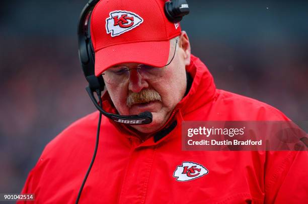 Head coach Andy Reid of the Kansas City Chiefs works against the Denver Broncos during a game at Sports Authority Field at Mile High on December 31,...