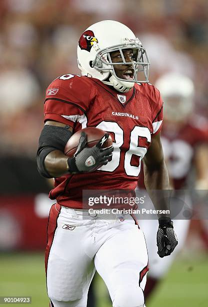 LaRod Stephens-Howling of the Arizona Cardinals carries the ball 89 yards for the punt return during the game against the San Diego Chargers at the...