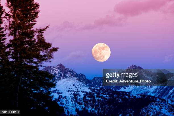 gore range sunset moonrise - vail colorado stock pictures, royalty-free photos & images