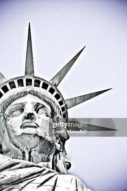 statue of liberty - low angle view stock illustrations