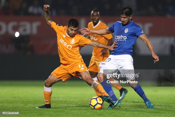 Porto's Mexican forward Jesus Corona vies with Feirense's Portuguese forward Hugo Seco during the Premier League 2016/17 match between CD Feirense...