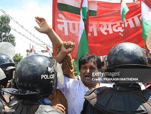 Nepalese police detain supporters of Vice President Parmananda Jha protesting the Supreme Court's order for him to retake the oath of secrecy and...