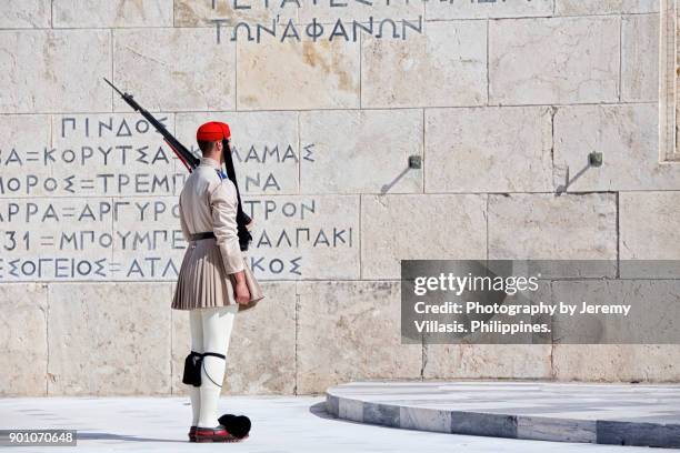 evzones during the changing of the guard,  tomb of the unkown soldier in athens, greece - unkown soldier stock pictures, royalty-free photos & images