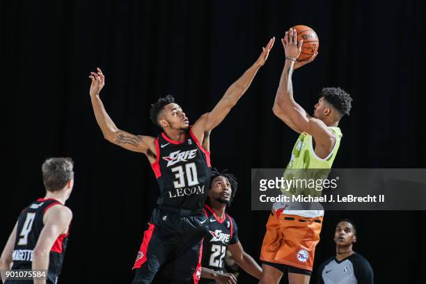 Jaylen Morris for the Erie Bayhawks attempts to block the shot of Devin Robinson against the Delaware 87ers, during an NBA G-League game on January...