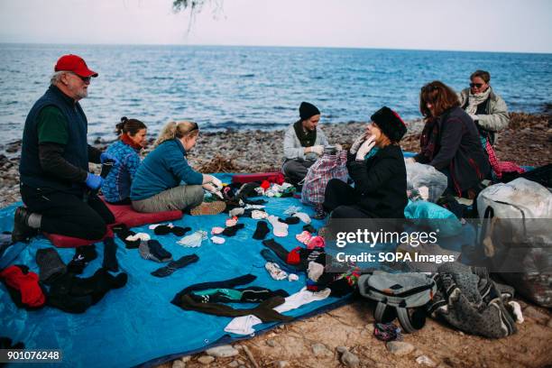 Pin socks parties take place right on the beach where refugees arrive every day. Dirty Girls of Lesbos is a volunteer group born in September 2015 by...
