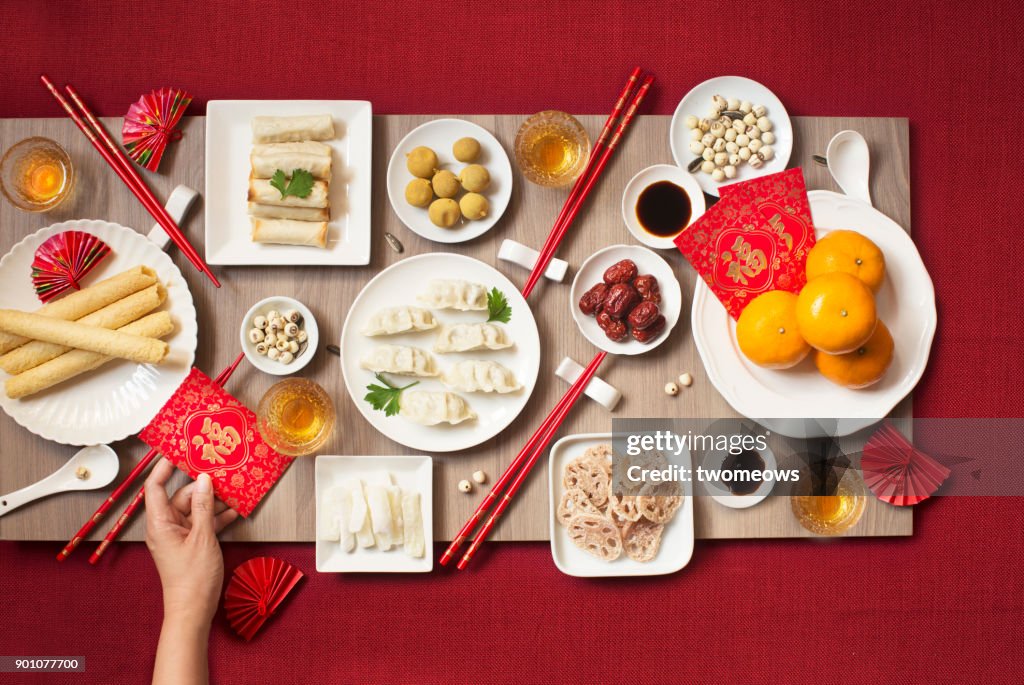 Flat lay Chinese new year reunion dinner, food and drink still life.
