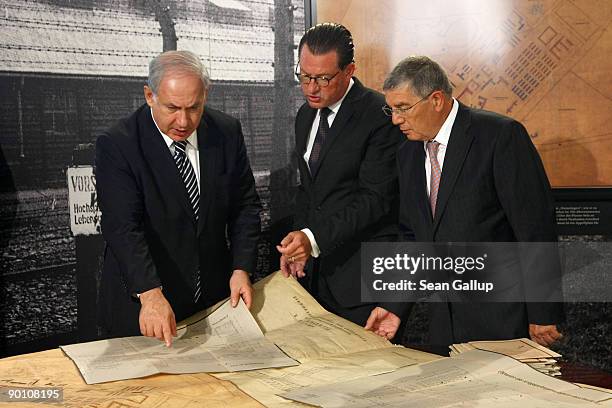 Israeli Prime Minister Benajmin Netanyahu looks at original construction plans of the Auschwitz and Auschwitz-Birkenau death camps with Bild...