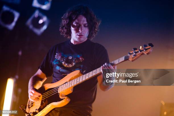 Bass player Nick O'Malley of British alternative rock band Arctic Monkeys performs on stage on the last day of Lowlands festival at...