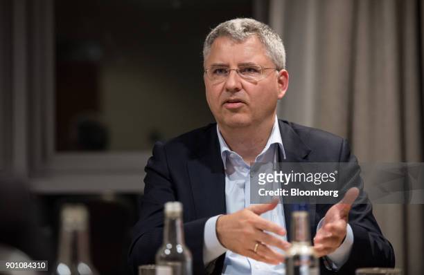Severin Schwan, chief executive officer Roche Holding AG, gestures as he speaks during an interview in London, U.K., on Wednesday, Dec. 6, 2017....